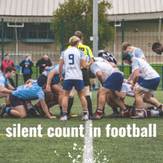 a group of people on a field ,what is a silent count in football